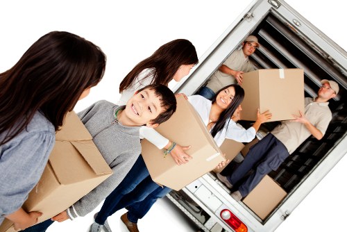 Removalists loading furniture for a local move in Petersham