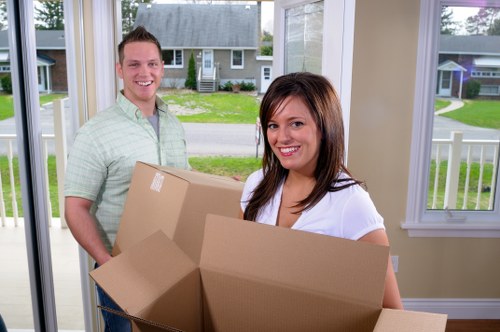Professional movers loading furniture for a Petersham relocation