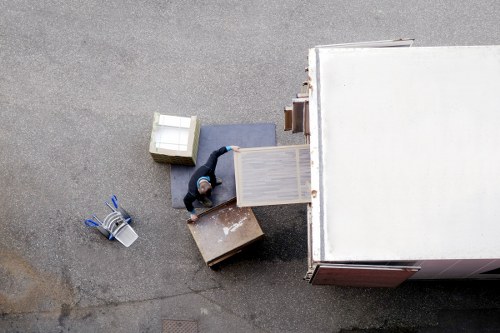 Customer handling stored items safely in a well-lit unit area